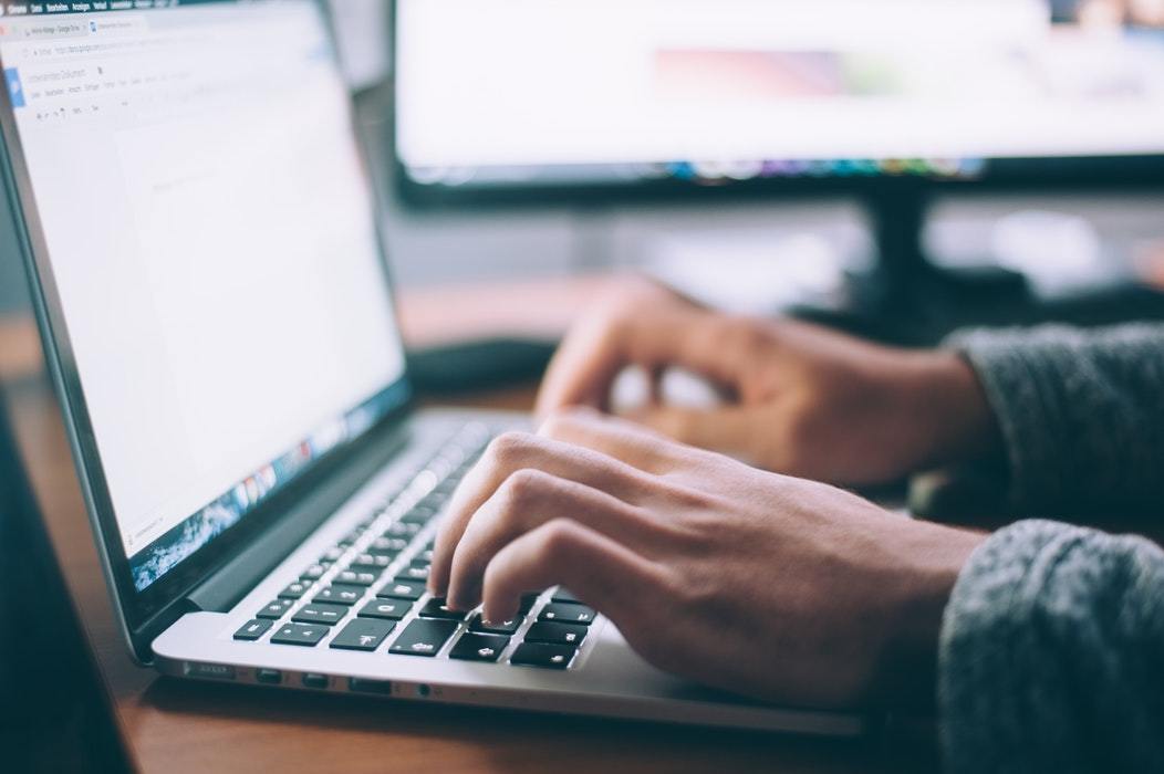personusinglaptop_unsplash